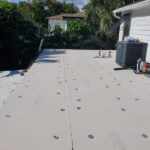 Home in Stancombe getting dec tec installed on two level roof